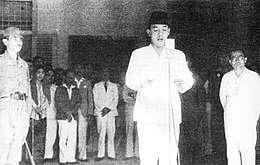 Sukarno proclaiming Indonesia's independence, with Hatta on the right