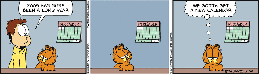 Jon: “2009 has sure been a long year” | Garfield looks at calendar | Garfield: “We gotta get a new calendar”