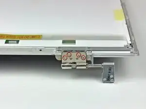 MacBook Pro 15" Core 2 Duo Models A1226 and A1260 Left Clutch Hinge Replacement