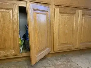 How to Fix A Crooked Cabinet Door