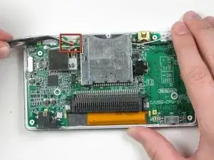 Disconnecting Nintendo DS Lite Logic Board