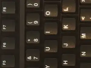 How to Remove The Logitech K120's Keycaps