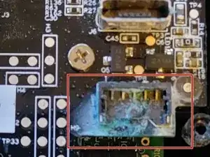 Remove corrosion from battery terminal