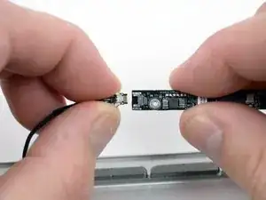 MacBook Pro 17" Unibody Camera/AirPort Cable Replacement