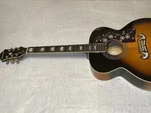 How to Clean and Restring an Epiphone EJ-200 Acoustic Guitar