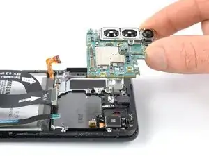 How to remove the motherboard assembly in the Samsung Galaxy S21 Plus