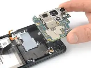 How to remove the motherboard assembly in the Samsung Galaxy S21 Ultra