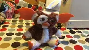 OK. So this is Gizmo. He sings fine, and you can hear the motor moving for his dancing, but he doesn't dance. Something has gone wrong with his insides.