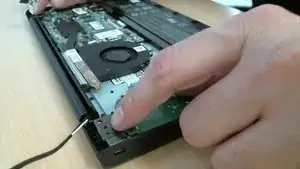 To separate the chromebook chassis from the LCD assembly, pull the chassis upward while holding the LCD assembly against the table. This will cause both hinges to move upward which will then allow enough space for the chassis to be detached from the LCD assembly's hinge joints. (See video)