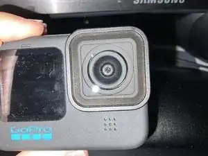 How to get the camera cover on and off on the GoPro Hero 10 Black