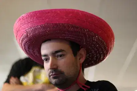 developer wearing a pink sombrero