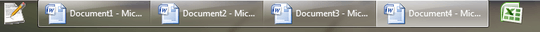 Cropped screenshot of the Windows 7 Taskbar showing several copies of MS Word running shown as seperate tabs while the bar is in the "Combine when full" setting.