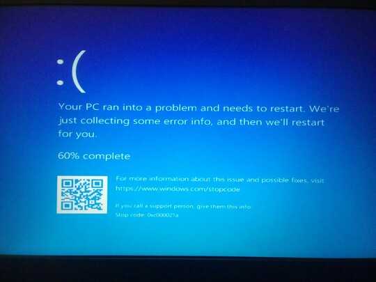 crappy image of BSOD error code: "0xc000021a"